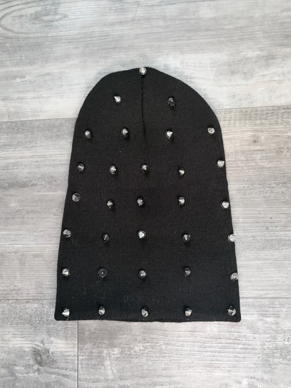 Silver and black spiked beanie